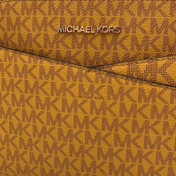 Michael Kors Medium Dome Xcross Xbody Bag
Color: Marigold Multi - Picture 15 of 15